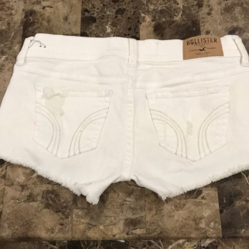 Short white with ripped under bags and back bags! - Picture 2 of 5